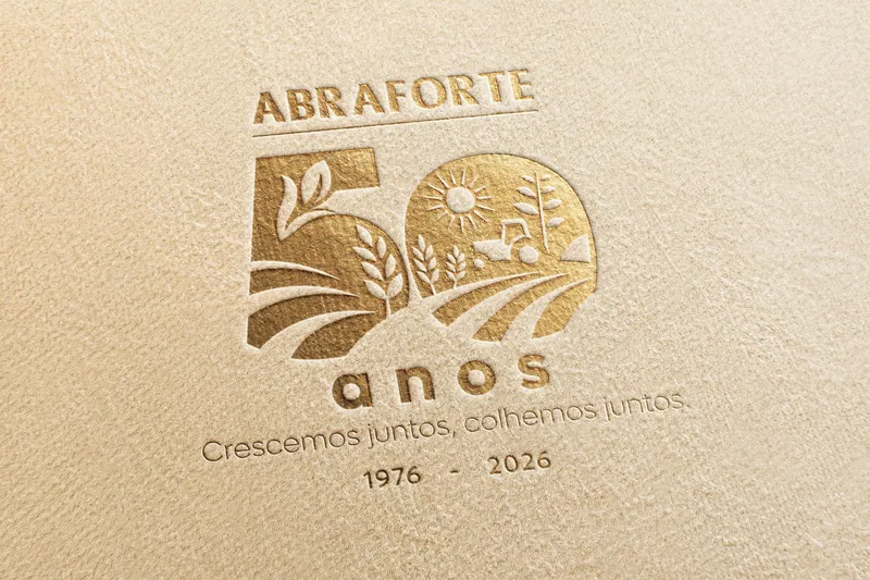 Abraforte 50-year anniversary seal embossed in gold on textured paper